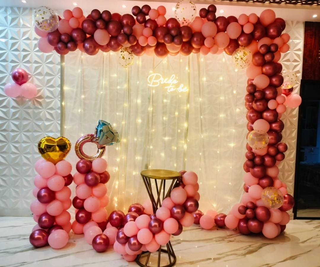 Bride to be balloon decoration in blush pink and maroon with neon sign